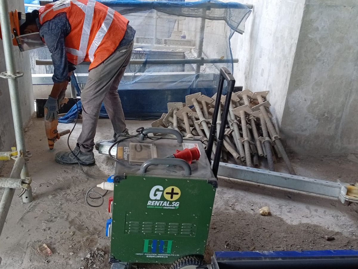 EH-One Plus portable BESS powering a hand tool at the work face on a Singapore construction site